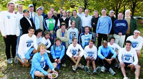 Members of the Ivy League Heptagonal champion 1979 cross-country team join the champion 2009 squad following their victory. Also pictured is former sports information director and athletics historian emeritus Bill Steinman (back row, right). Photos: Gene Boyars, Columbia Athletics